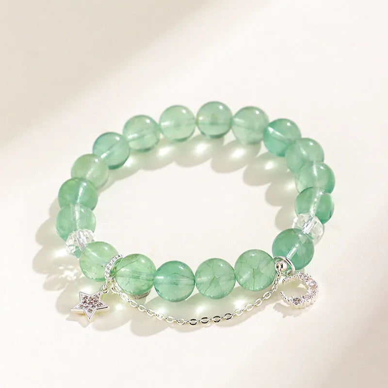 Green fluorite star moon princess bracelet with white crystal accents and electroplated finish