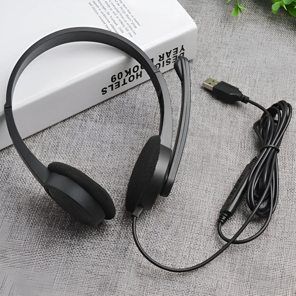 Black USB wired gaming headset with microphone, sponge ear pads and PVC cable for PC computer use