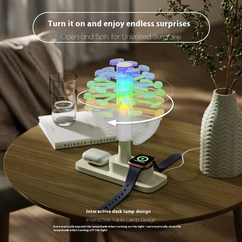 Modern geometric spiral tree shaped LED desk lamp on a wooden surface