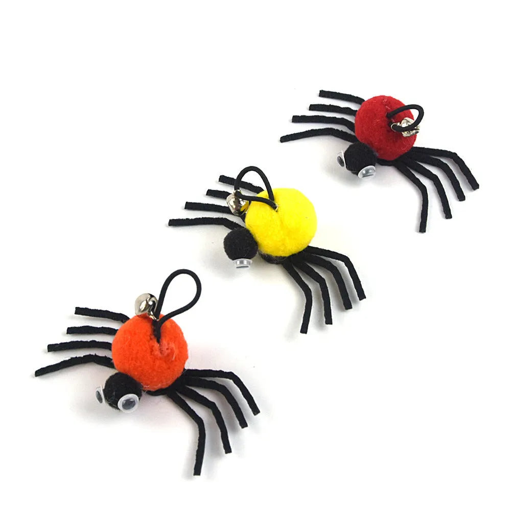 Small Halloween plush cat toy in orange red and yellow measuring 4.5 by 9 centimetres