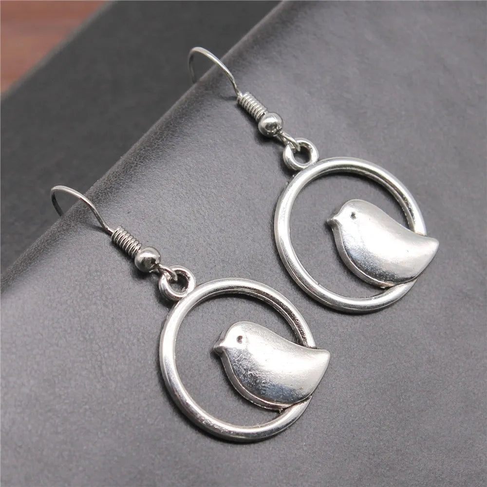 Retro simple handmade bird earrings in ancient silver finish with 20mm earring and 18x19mm ear hook