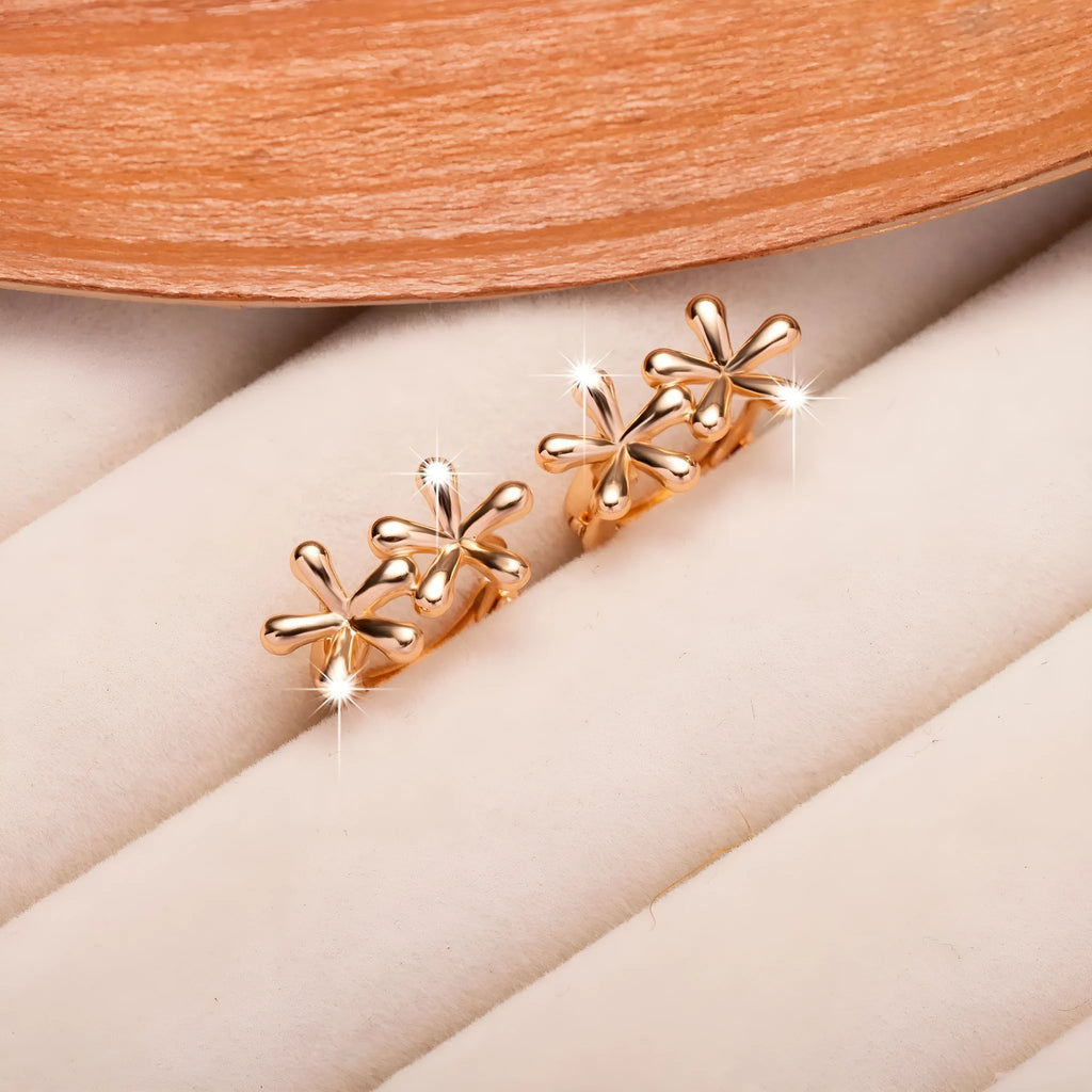 A pair of circular rose gold waterdrop flower earrings for women with a fresh, sweet style.