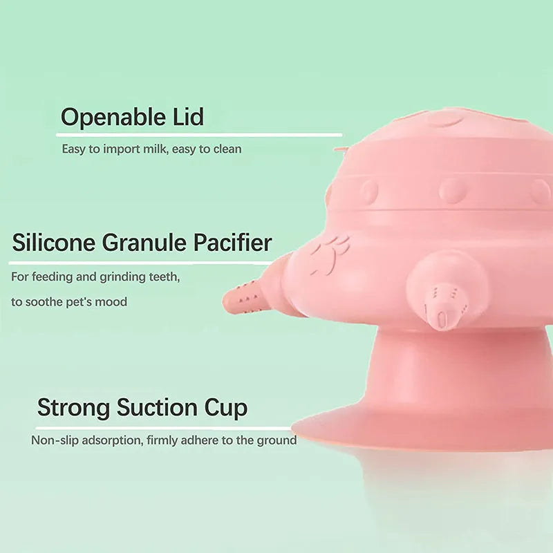 Pink silicone pet nursing bottle with four teats and a flat base.