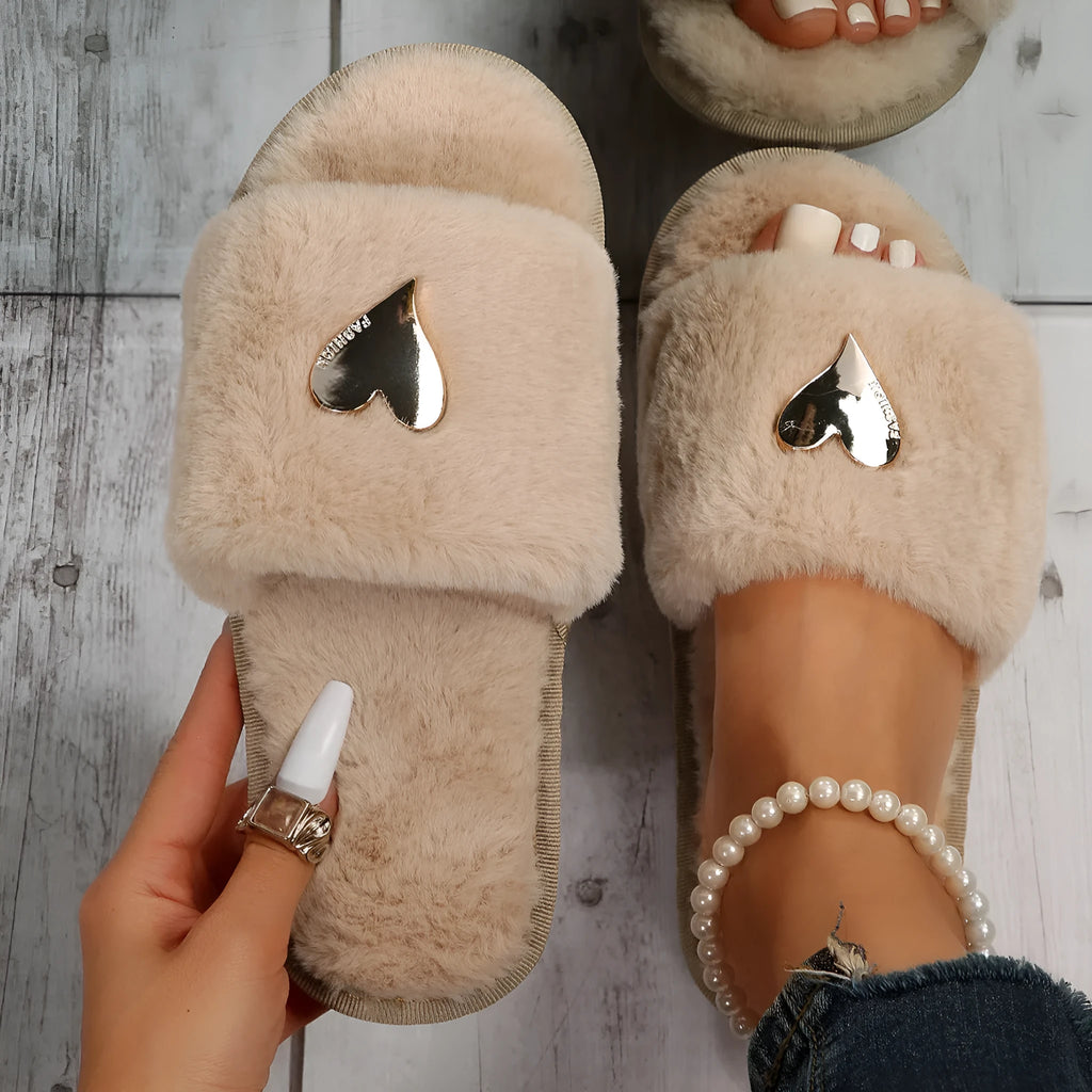 Warm faux fur slippers for women in beige with heart pendant detail and plastic sole