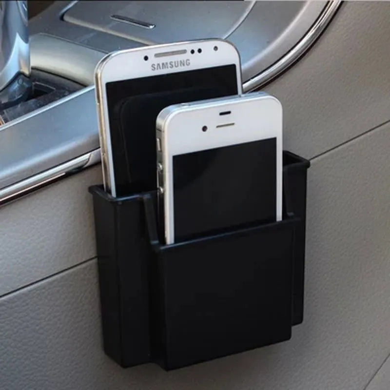 Black ABS car vent mobile phone storage box with card holder slot on interior background