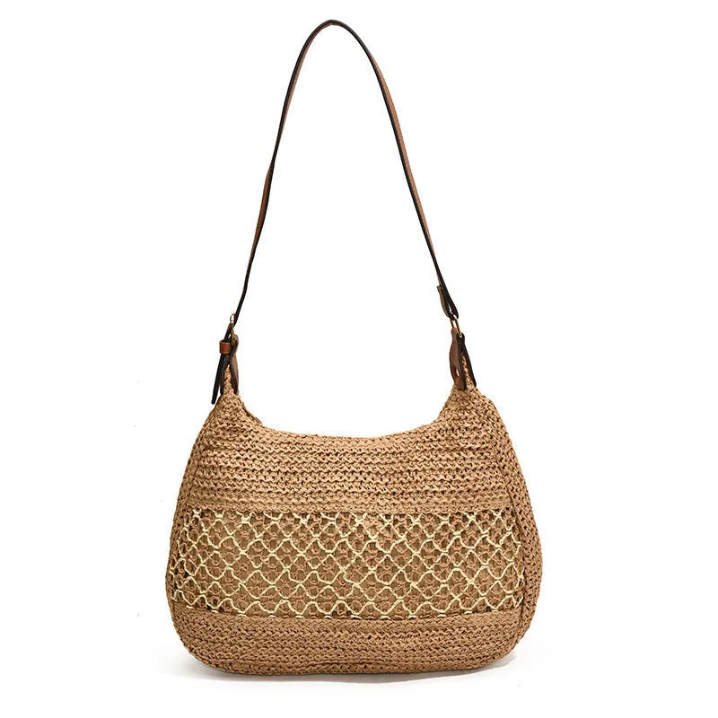 Khaki coloured straw cross body bag with a square shape and an external sandwich pocket.