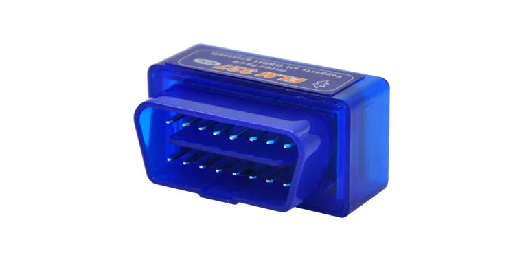 Small black ELM327 OBD2 Bluetooth car diagnostic scanner plugged into a vehicle port.