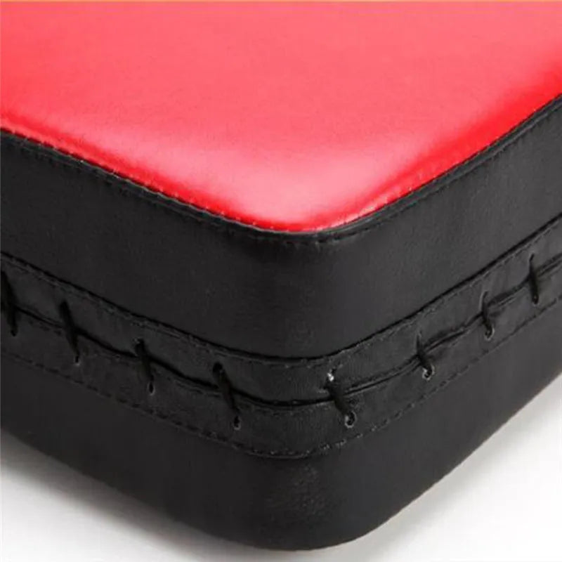 Thickened square foot boxing target in blue or red with vertical stripes for martial arts training