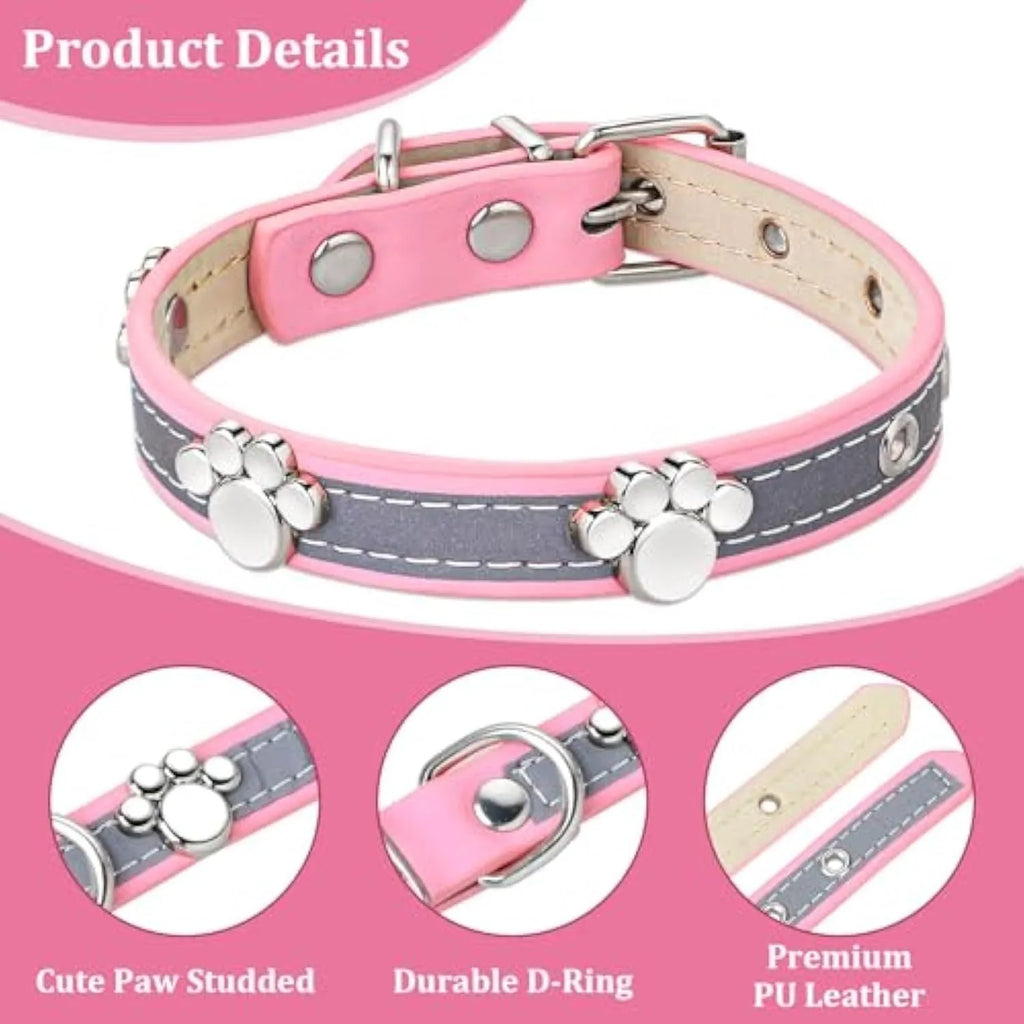 Reflective adjustable leather dog collar with paw rivet on a grey background.