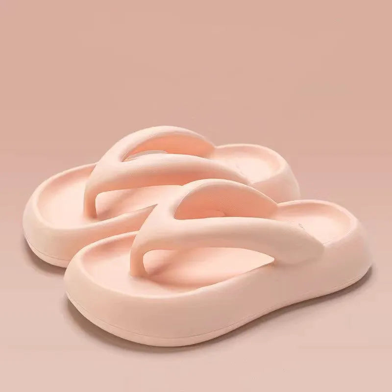 Solid colour EVA thong sandals with a thick sole and a decorative bow on the strap.