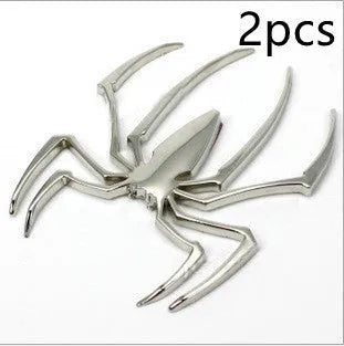 Three-dimensional metal spider car sticker in zinc alloy on a vehicle bumper.