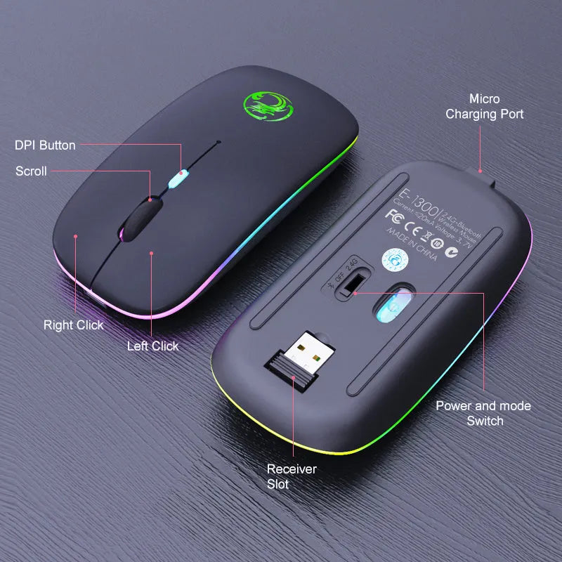 Black and white dual-mode wireless silent mouse with luminous charging scroll wheel on a desk.