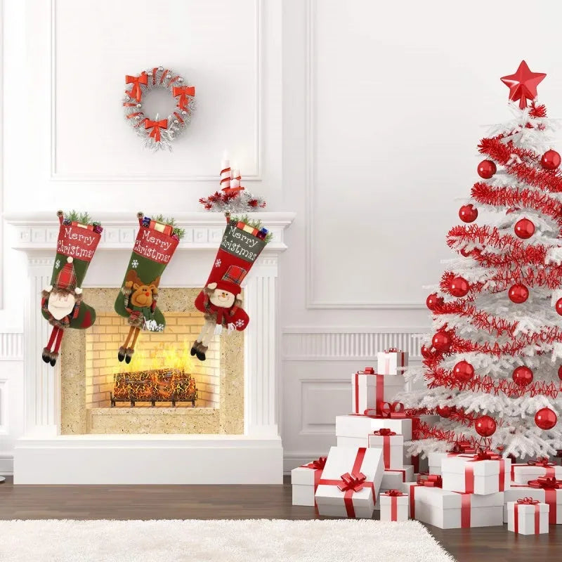 Three large Christmas stockings with Santa Snowman Reindeer 3D plush designs for holiday tree decoration