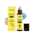 Helichrysum anti-aging ball oil in 10ml glass bottle with roll-on applicator, next to helichrysum flowers