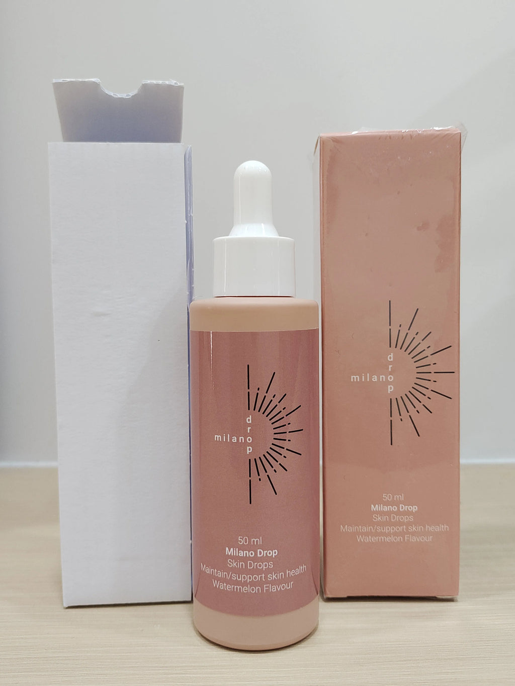 50ml bottle of dark bronzer tanning serum for face and body in a mi Lian colour box.