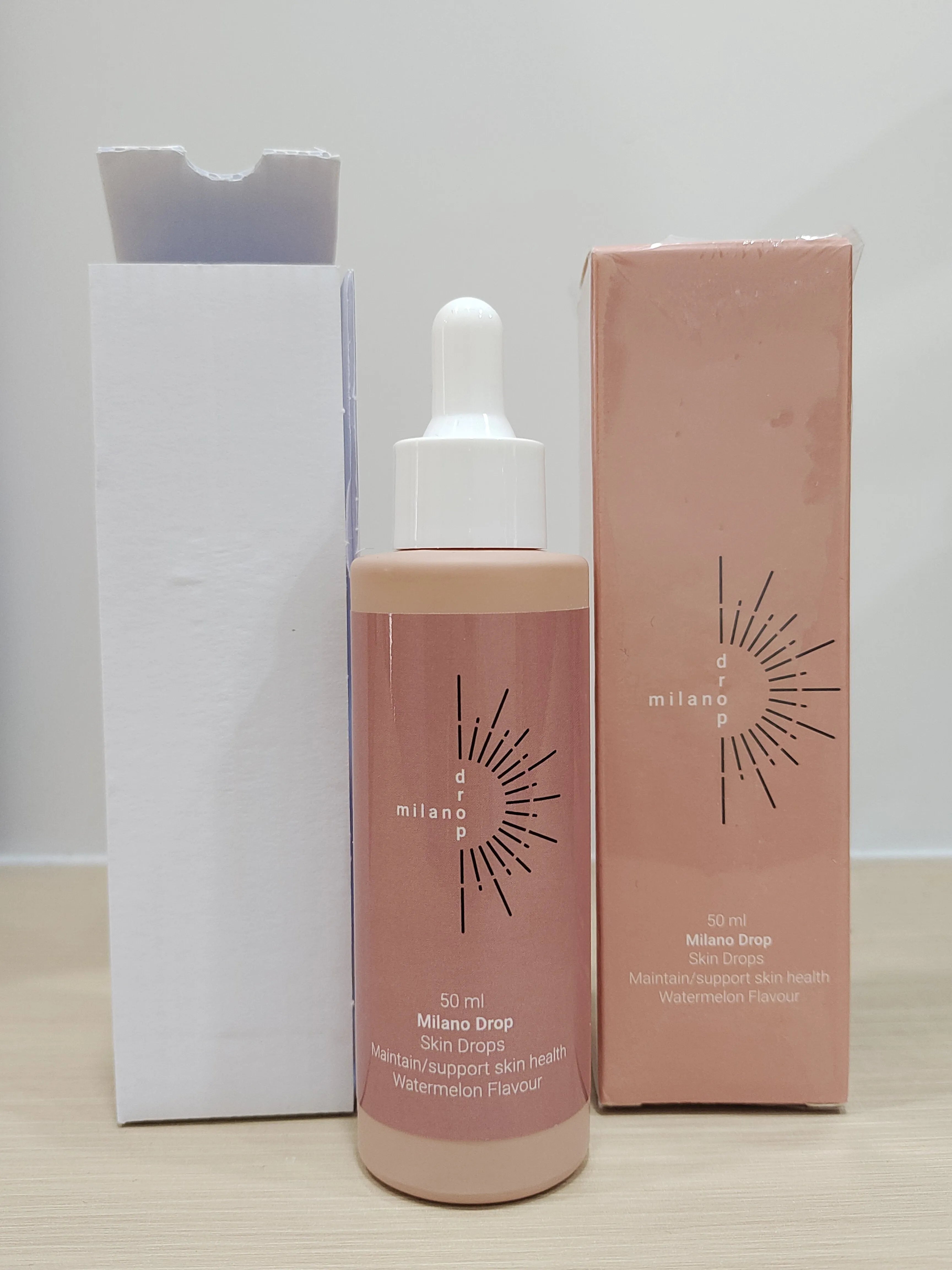 50ml bottle of dark bronzer tanning serum for face and body in a mi Lian colour box.