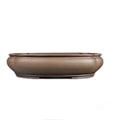 Handmade antique papaya-shaped flower pot made from natural purple clay.