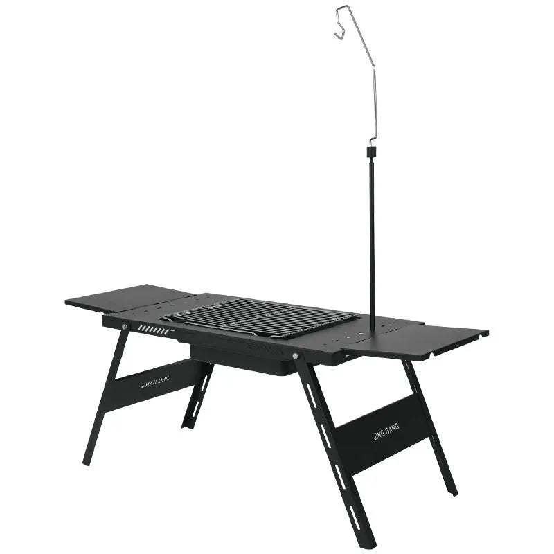 Folding multifunctional travel barbecue table with black steel construction and integrated cooking surface