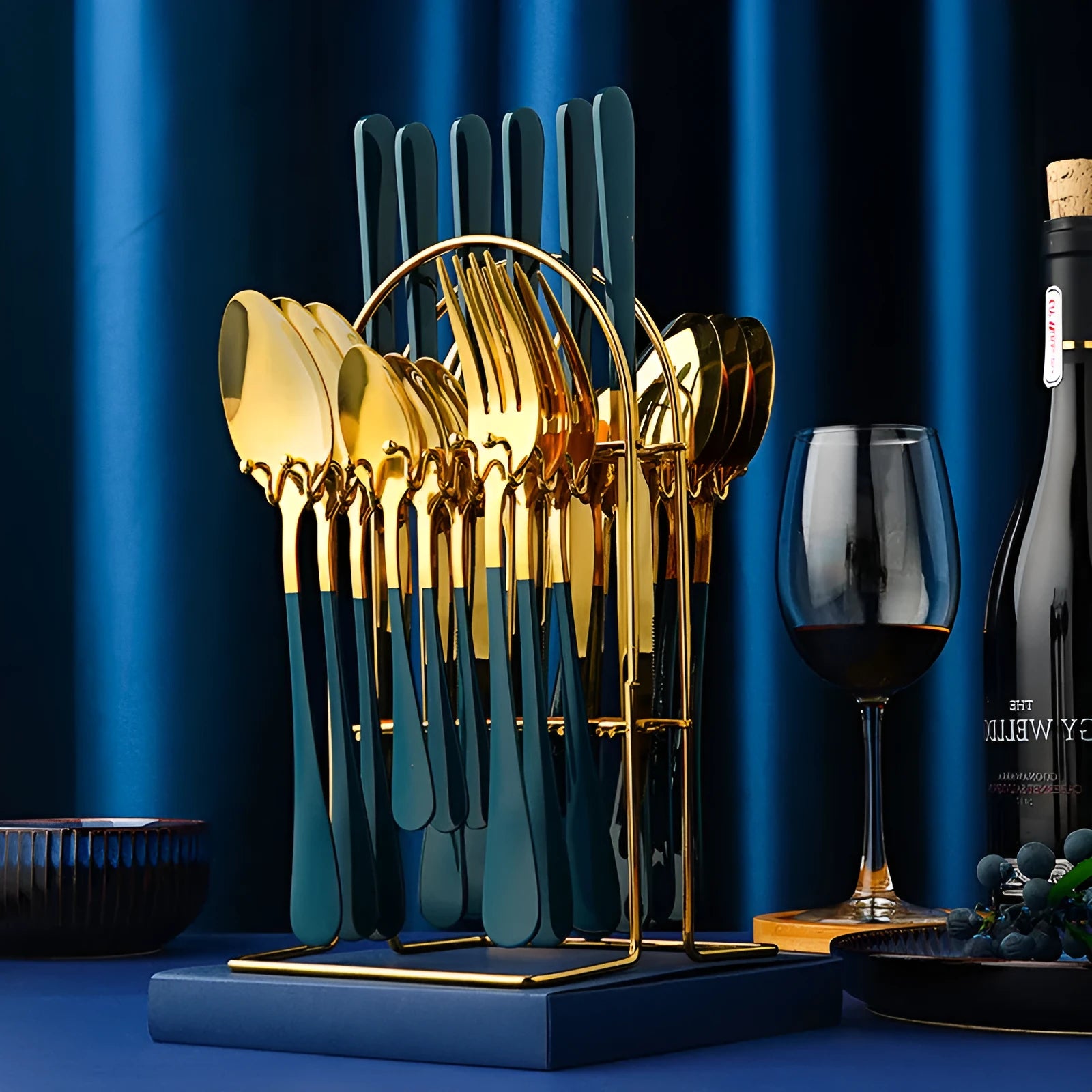 24-piece stainless steel cutlery set with storage rack showing knives forks spoons in metallic finish