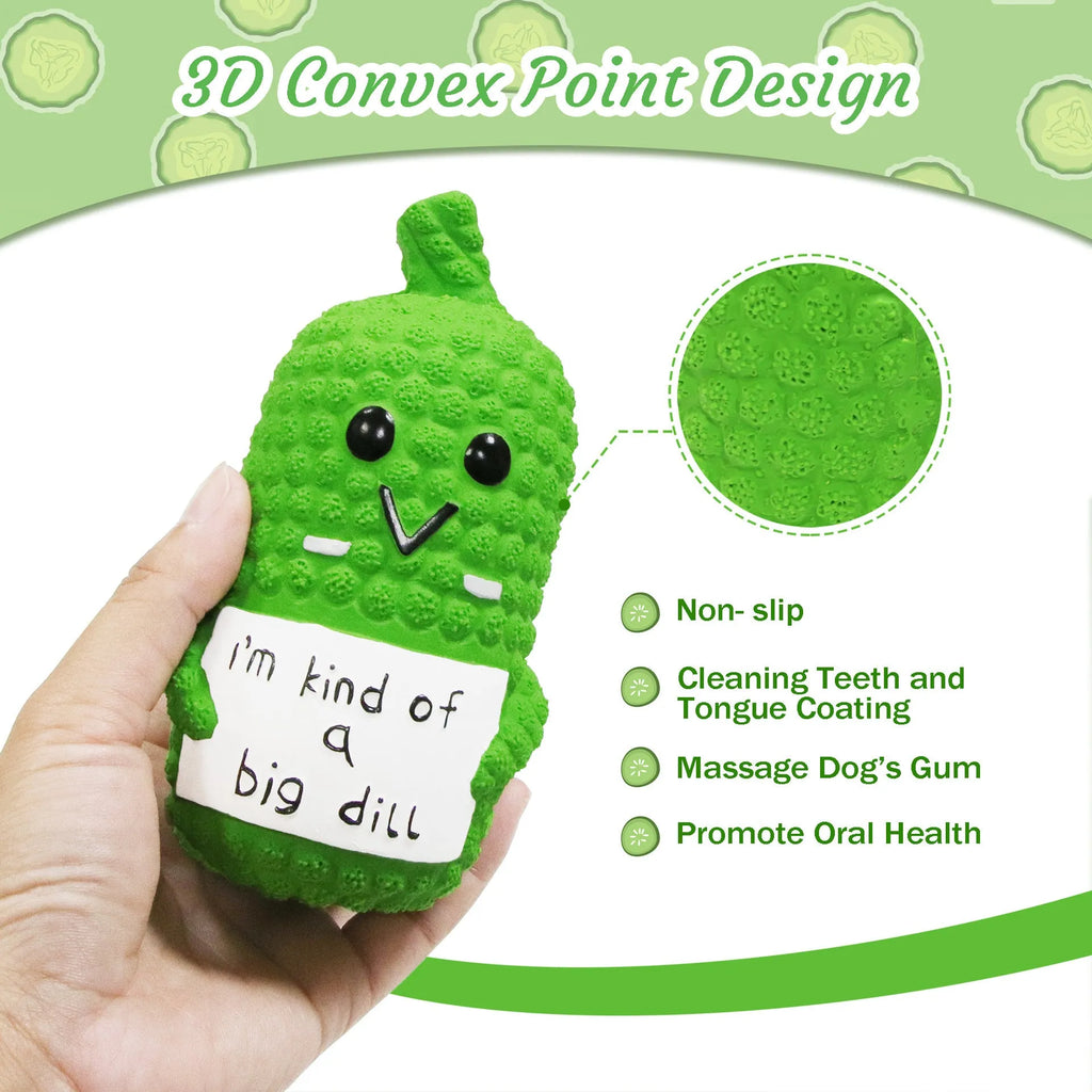 Green pickle-shaped latex squeaky dog toy with textured nubs on a white background.