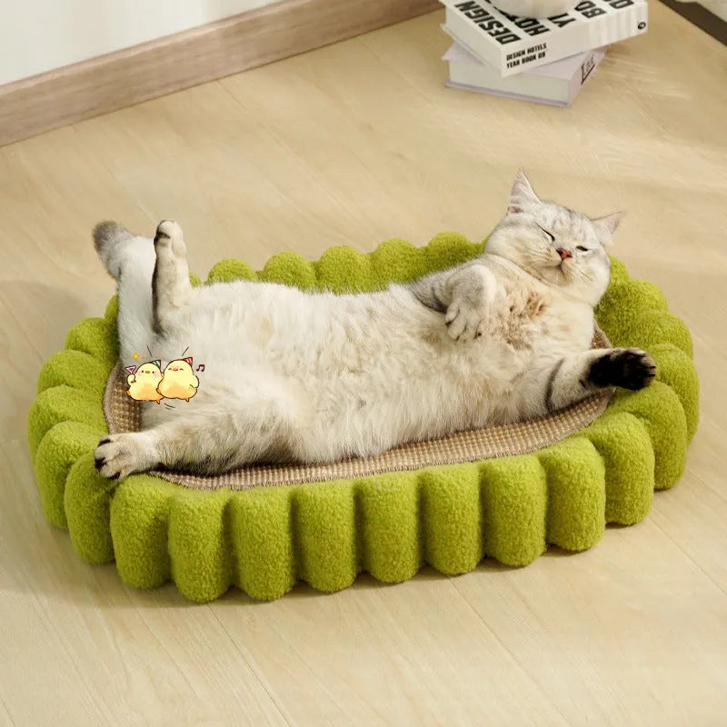 Green oval sisal cat scratch pad bowl serving as a cat bed and scratcher.