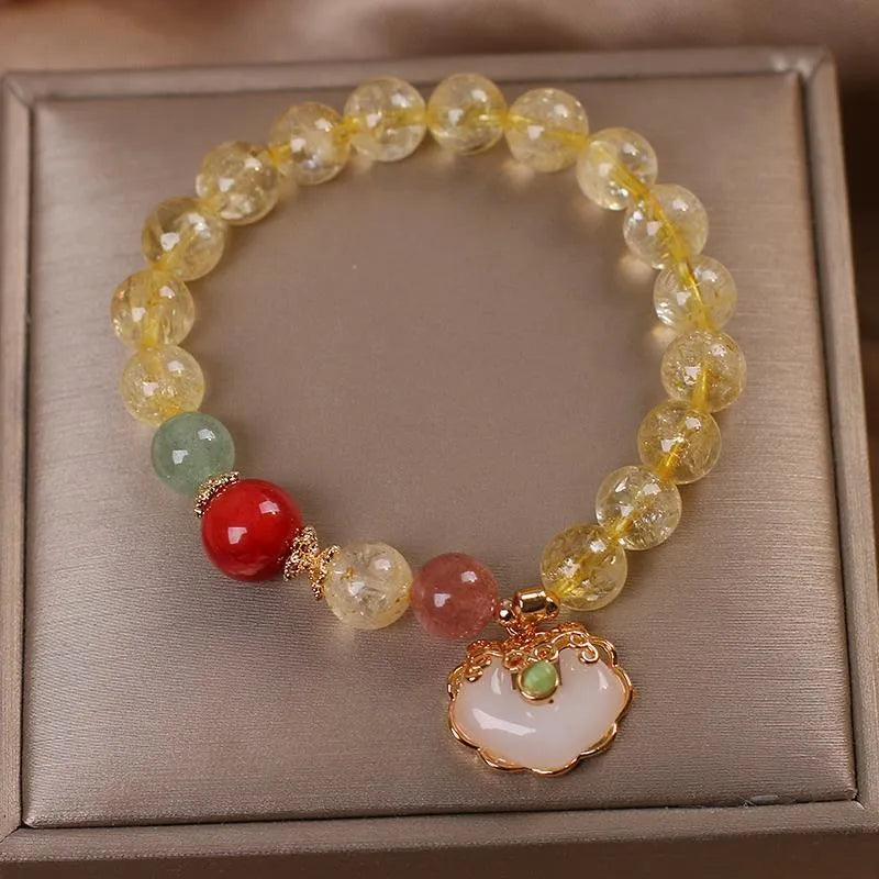 Women's bracelet with natural citrine jade ruyi pendant in yellow hair crystal colour on alloy band