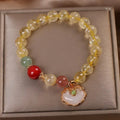 Women's bracelet with natural citrine jade ruyi pendant in yellow hair crystal colour on alloy band