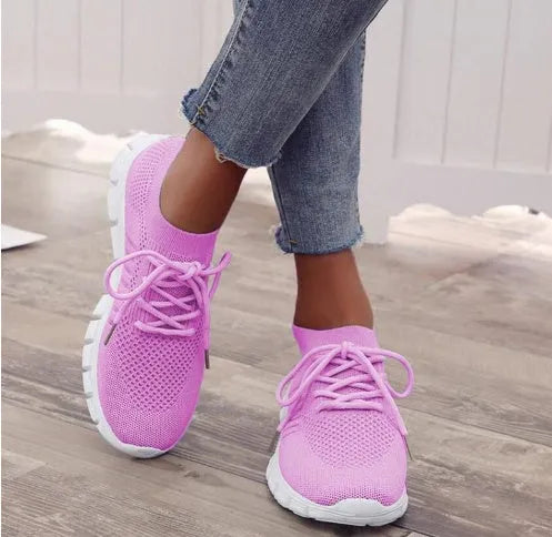 Women's high-cut lace-up platform sneakers in a casual style with a breathable upper and rubber sole
