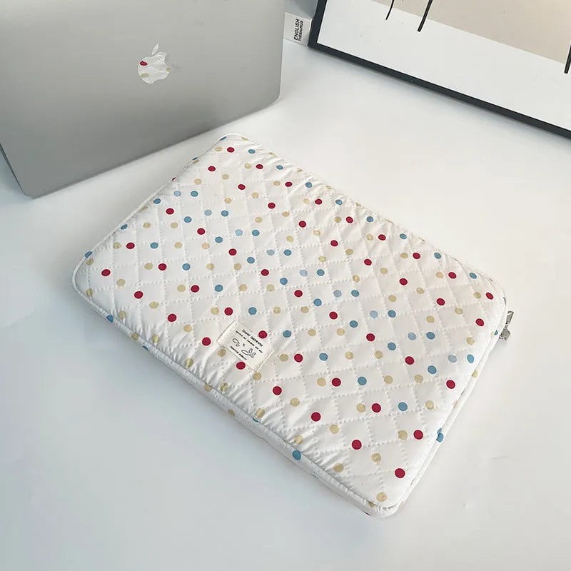 Women's polka dot laptop bag in solid colour with size options for 11, 13, and 15.6 inch computers.