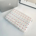 Women's polka dot laptop bag in solid colour with size options for 11, 13, and 15.6 inch computers.