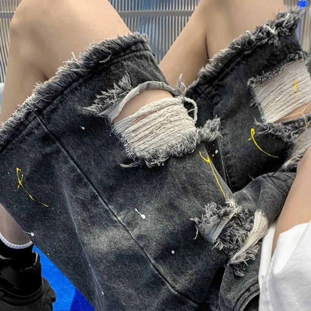 Men's water washed hole denim shorts in loose fit street style