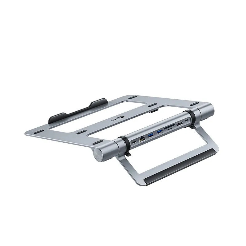 Aluminium alloy notebook docking station with multiple USB 3.0 ports and cable on desk