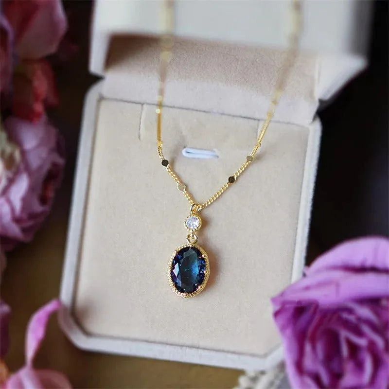 Gold colour geometric pendant on a chain, French retro necklace design