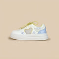 Korean-style white and blue sneakers with mesh cross-straps and lace-up closure for children.