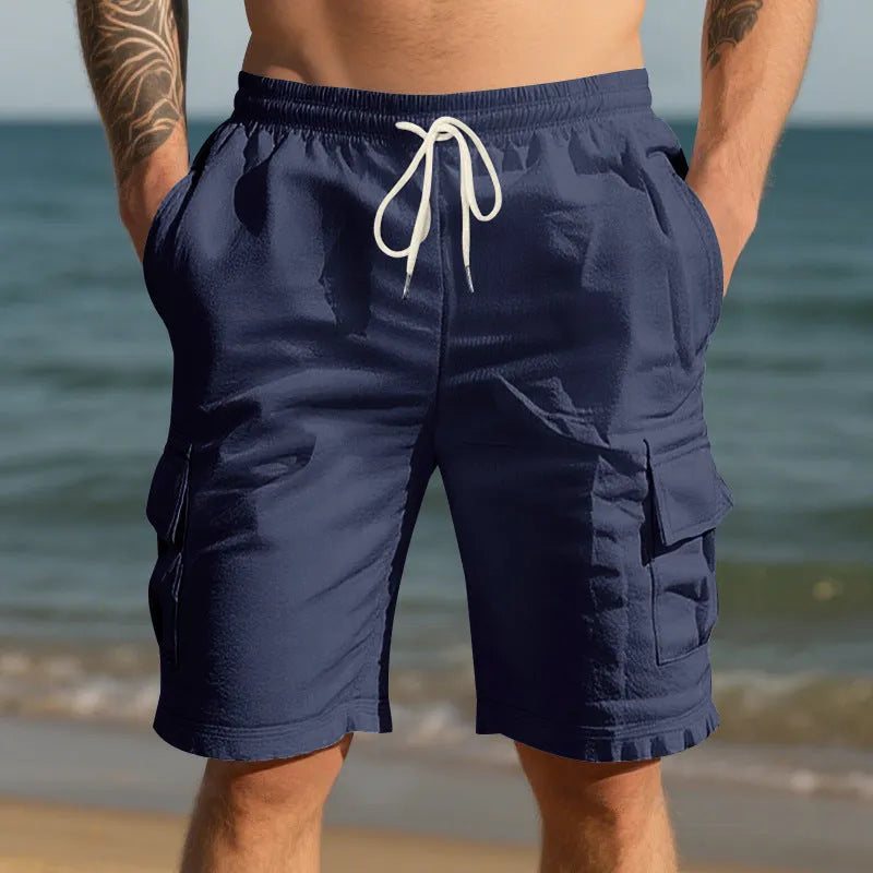 Men's linen blend casual shorts with multiple pockets in light blue colour showing loose-fit design
