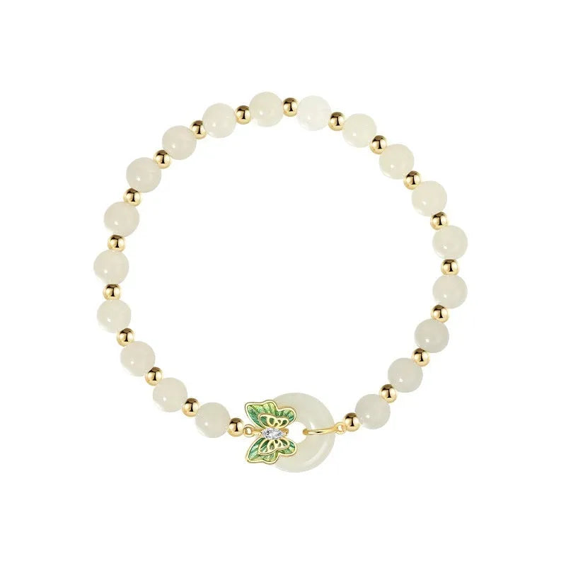 Cyan Hetian jade bracelet for women with a sterling silver butterfly inlay