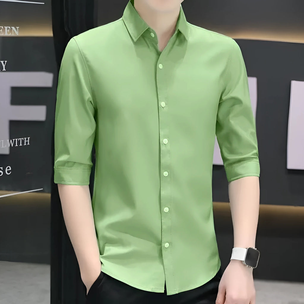 Men's slim-fit half-sleeve shirt in a linen-silk blend, shown in a solid colour with three-quarter length sleeves.