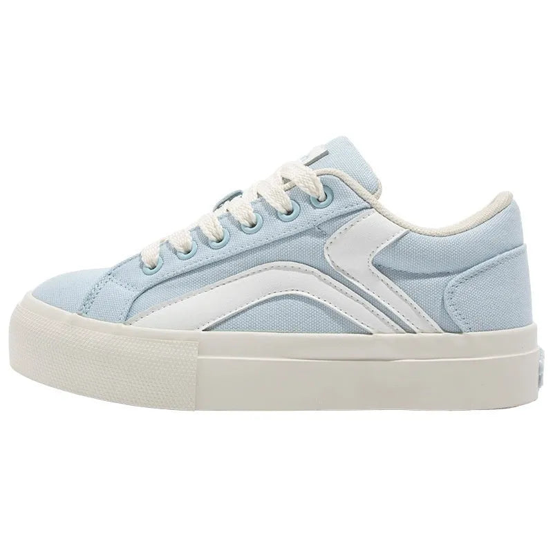 Women's low-top lace-up board shoes with vulcanised rubber sole and round toe in multiple colour options.