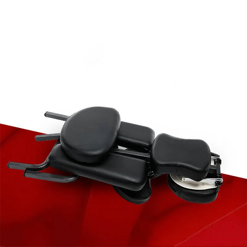 Folding massage chair in black with PVC leather seat and wood steel frame for tattooing and massage use