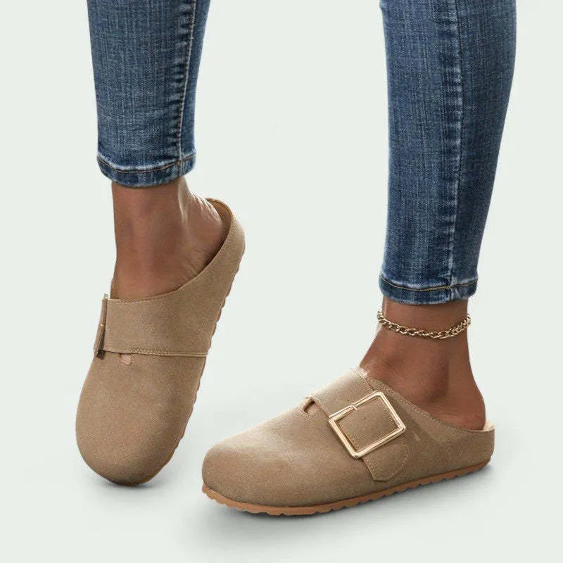 Women's brown canvas closed toe slippers with low top design