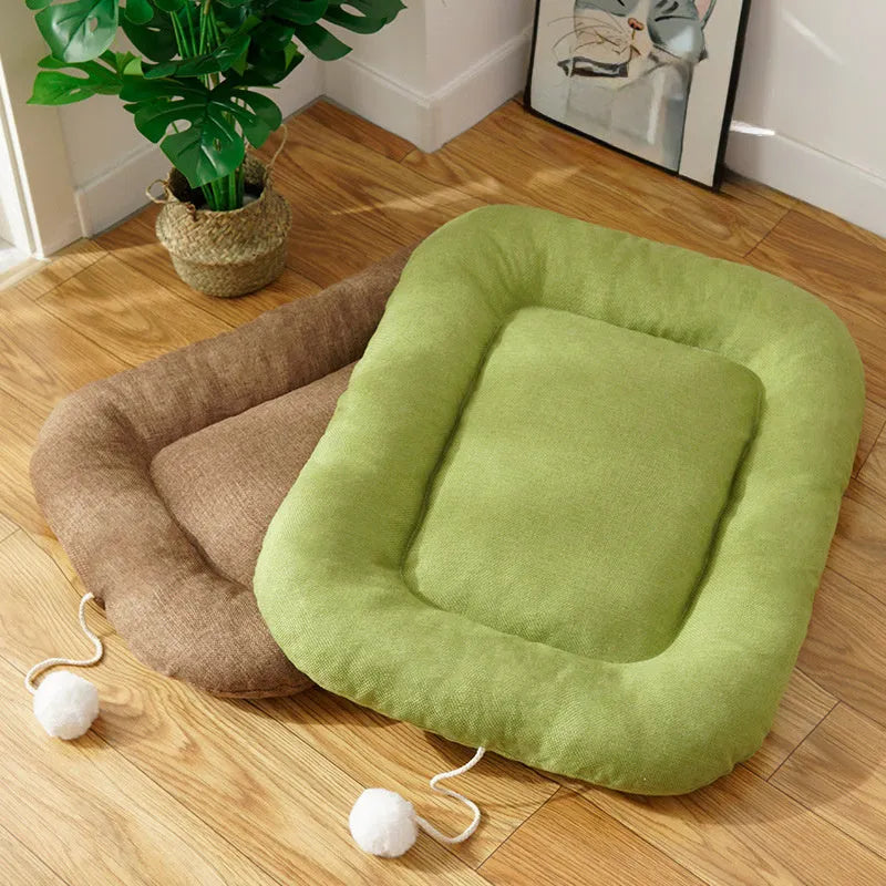 Brown Thai-style pet cooling mat shown inside a dog kennel with a small dog resting on it.