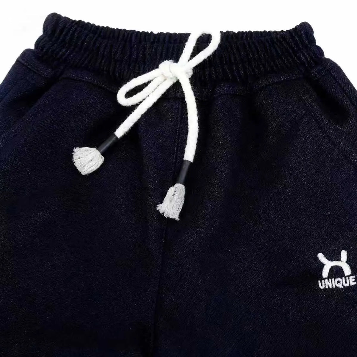 Children's trousers with drawstring waist and ribbed hem, sizes 22-26, black or blue, 96% polyester 4% spandex