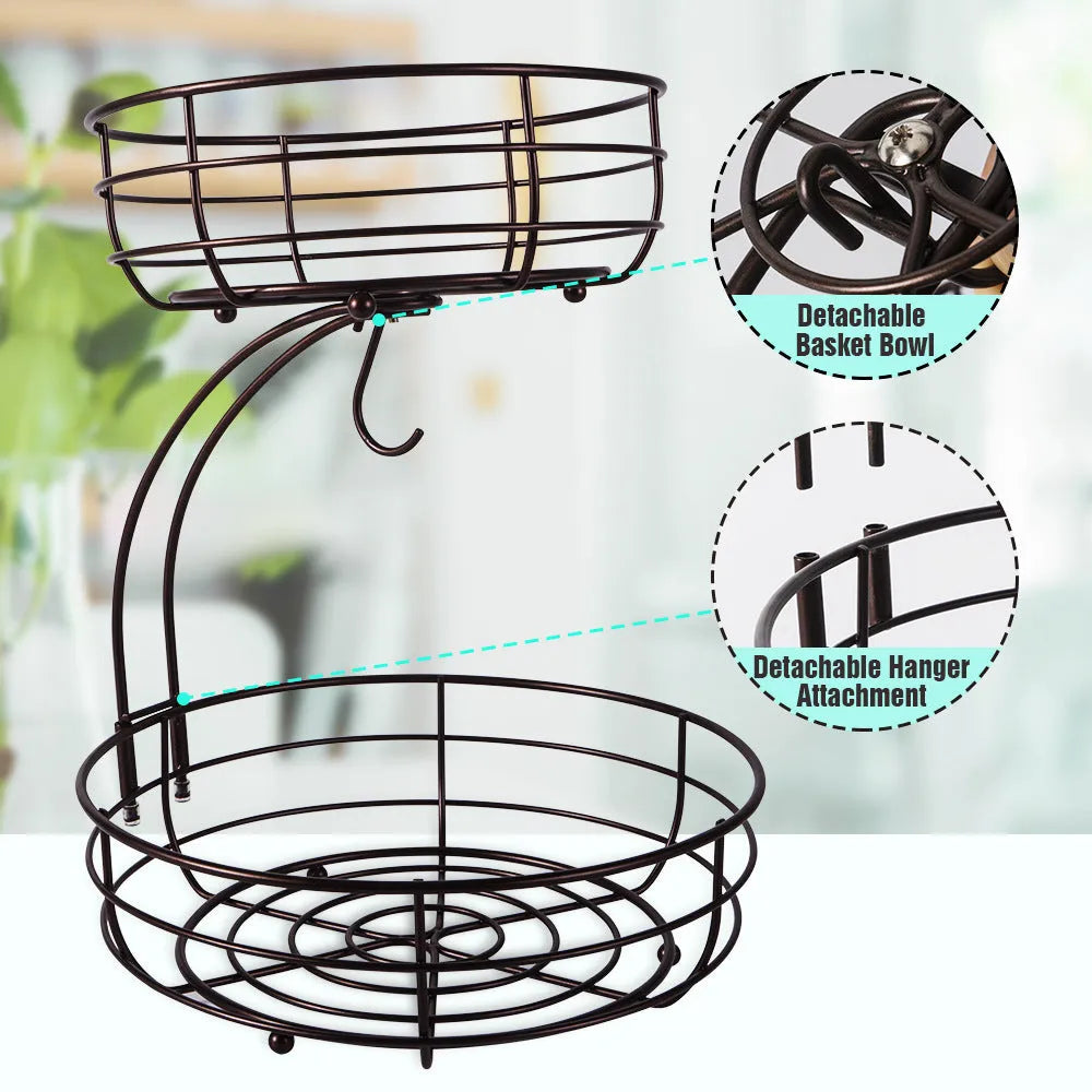 Double-layer black and gold wrought iron fruit basket for kitchen or restaurant storage.