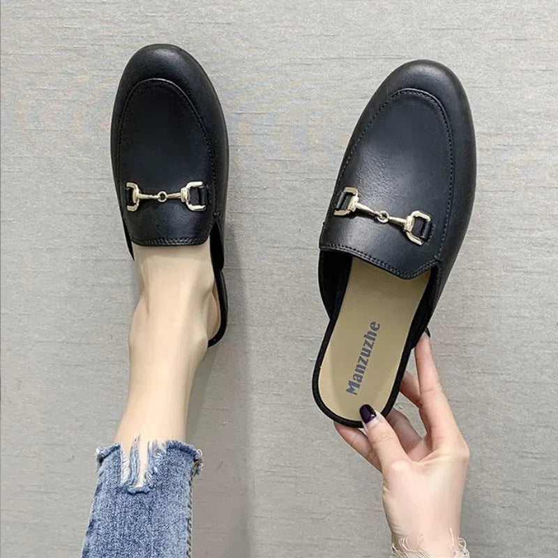 Women's PVC closed-toe half slipper with a buckle, shown in milky white colour.