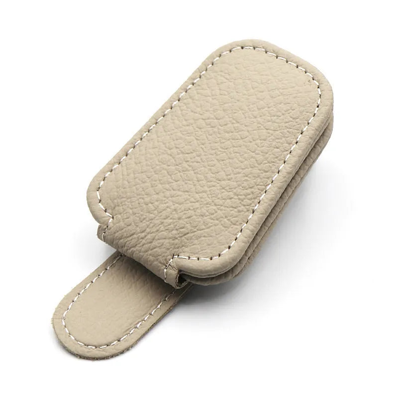 PU leather sunglasses clip holder attached to a car sun visor