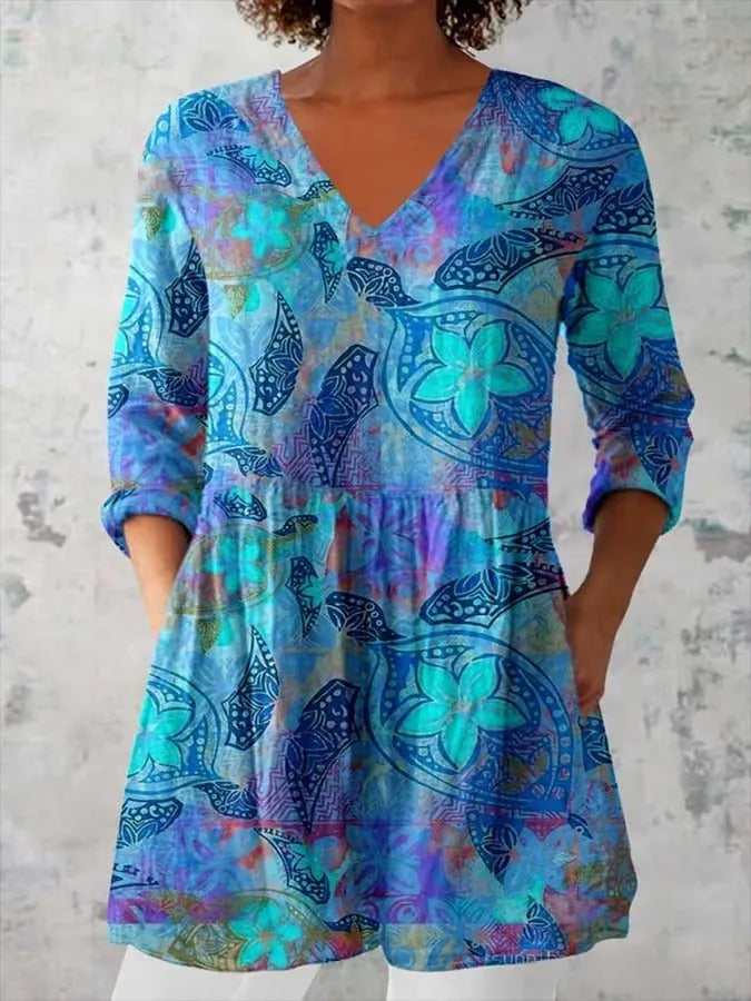 Women's retro-style slim fit long-sleeved top with a printed pattern, shown in a colour option.