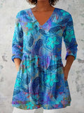 Women's retro-style slim fit long-sleeved top with a printed pattern, shown in a colour option.