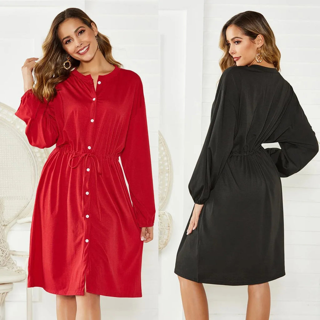 Black polyester A-line dress with an elastic waist, long sleeves, and a matching belt.