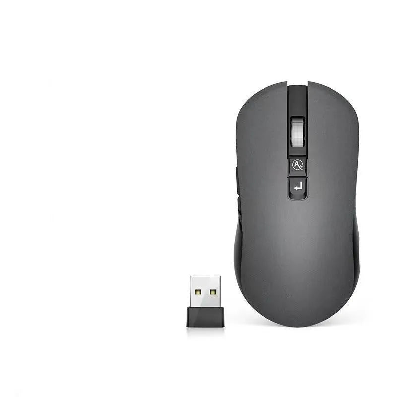 IFLYTEK voice translation wireless gaming mouse with mute microphone on a desk.