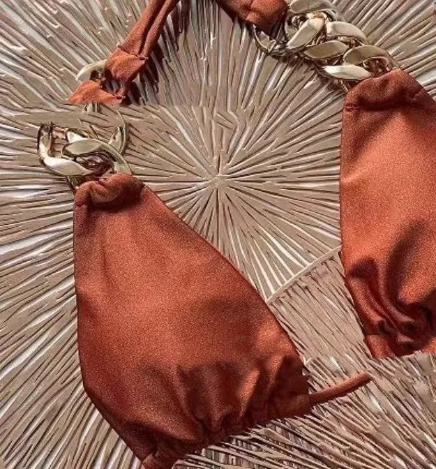 Brown women's tube top ring tether push up bikini swimsuit laid flat.